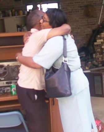 Big Sisiter Patty showing love to Dad.